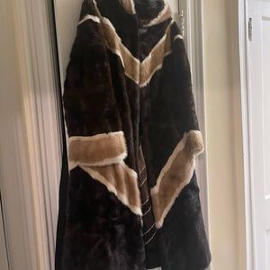Mink hooded coat Extremely warm in great condition.